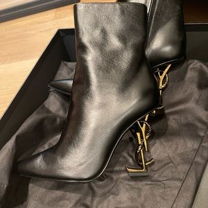 YSL Opyum Boots. Never worn, bottoms are perfect. 2 dust bags and original box